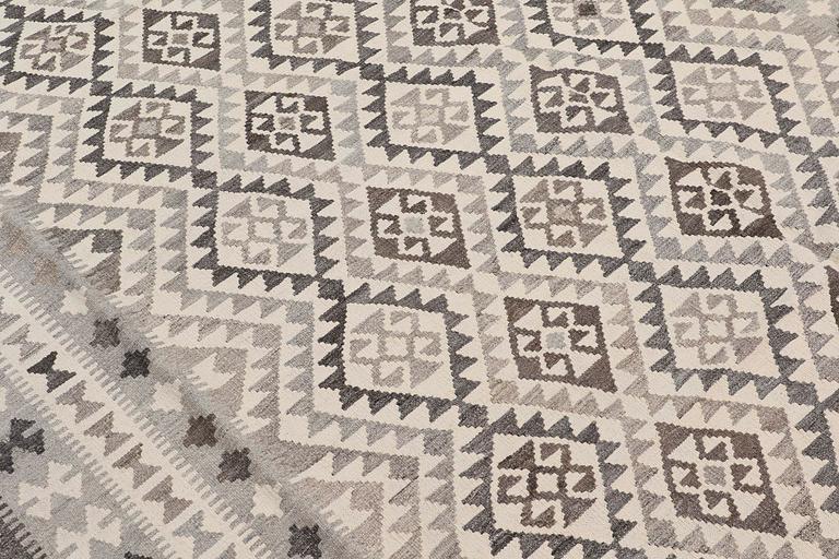A Kelim carpet, 295 x 200 cm.