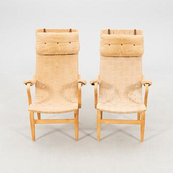 Bruno Mathsson, a pair of "Eva high" armchairs, late 20th century.