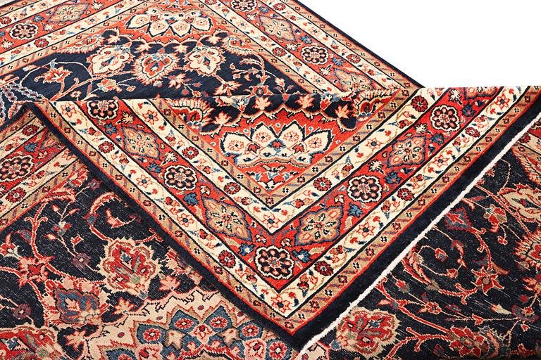 A Hamadan carpet, c. 312 x 216 cm.