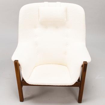 CARL GUSTAF HIORT AF ORNÄS, A 1960s 'Caravelle' armchair and ottoman for Puunveisto Oy - Wood work Ltd.