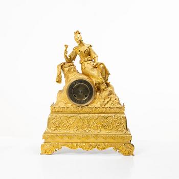 A Late Empire table clock, 19th century.