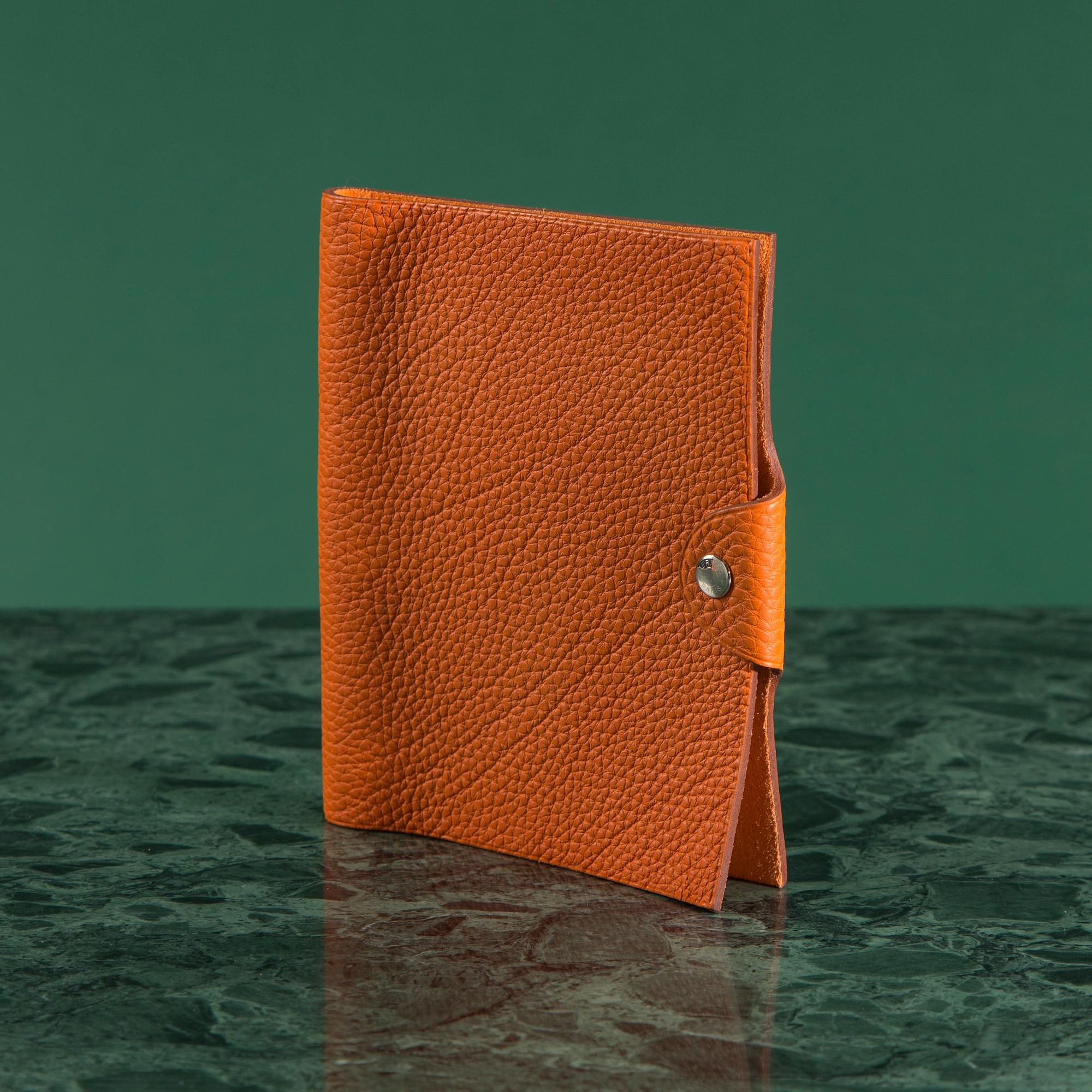 NOTEBOOK COVER by Hermès.