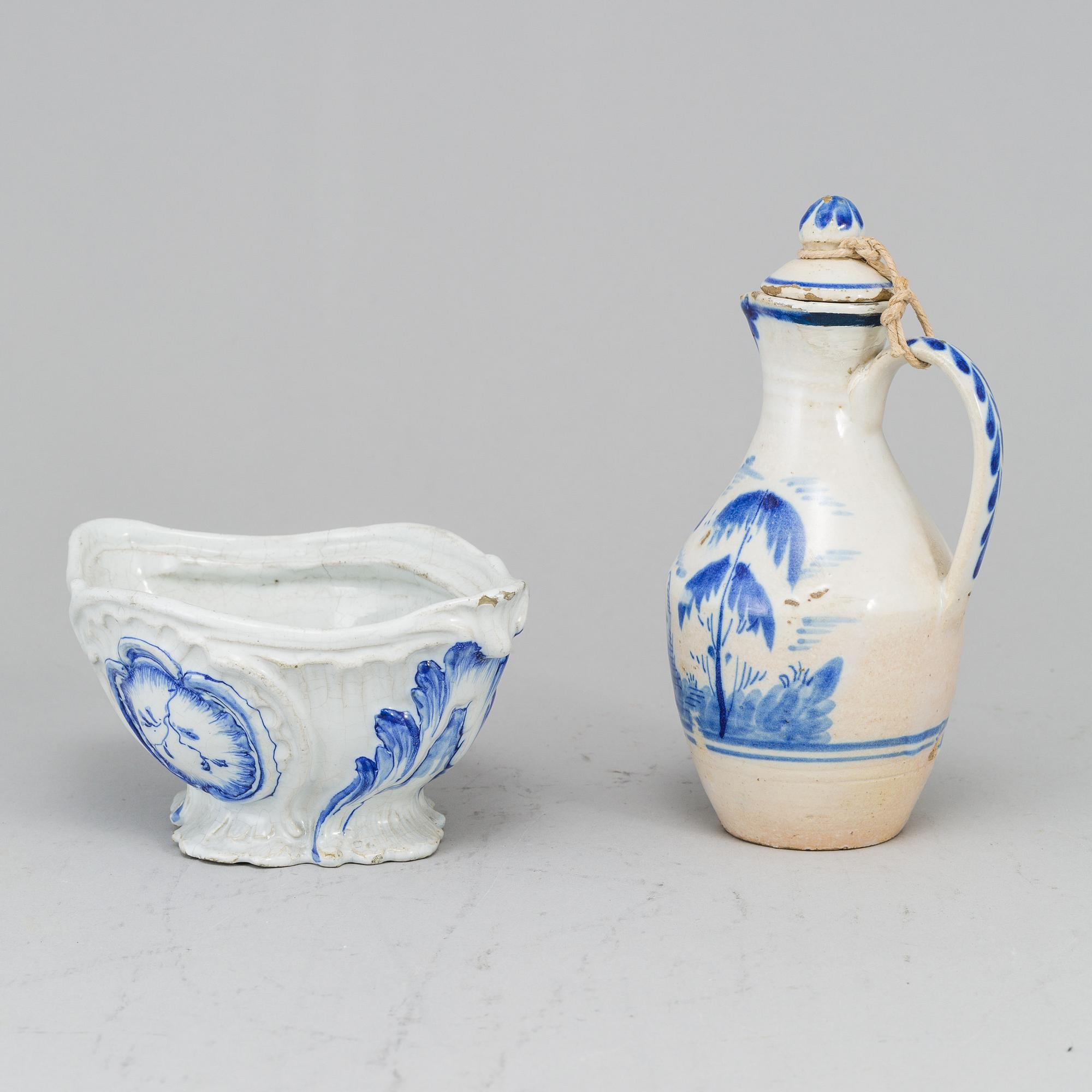 A faience tureen, unmarked, presumably Mariberg, 18th Century and a ewer with cover, 18th Century, unmarked.