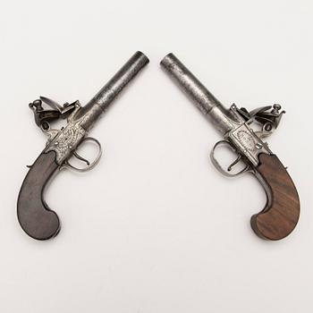 A pair of english boxlock flintock pistols marked E. Bond London, circa 1800.