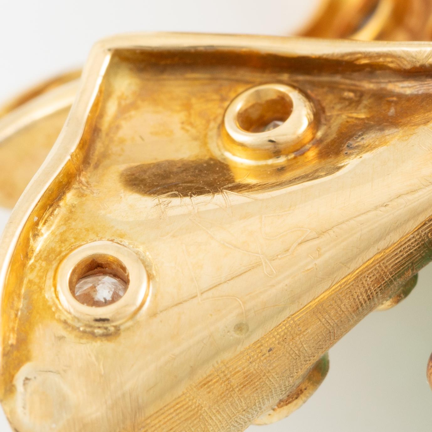 Brooch in the form of a butterfly, 14K gold with carved emerald, sapphires, emeralds, rubies, and diamonds. Second half of the 20th century.