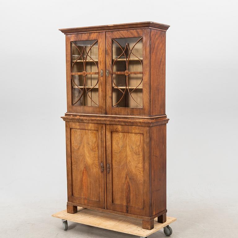 A mid 1800s mahogany book cabinet.