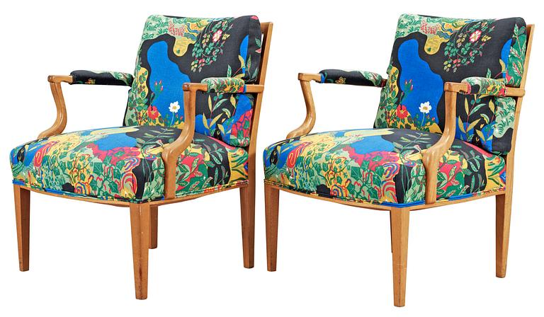 A pair of Josef Frank mahogany and rattan armchairs, Svenskt Tenn,