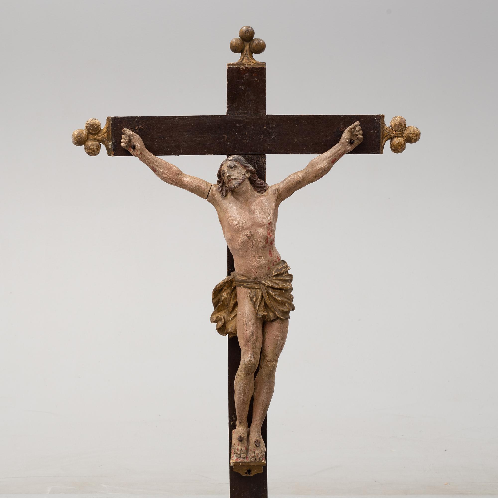 A 17TH CENTURY WOODEN CRUCIFIX, baroque.