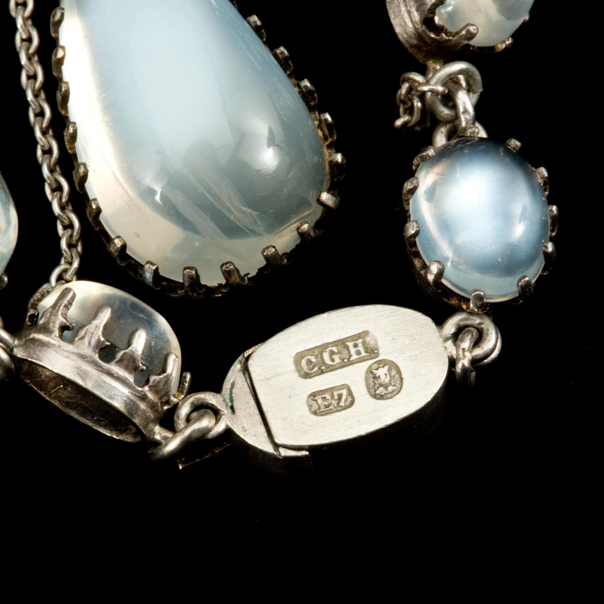 A cabochon-cut moonstone necklace. Made by C G Hallberg, Stockholm 1907.