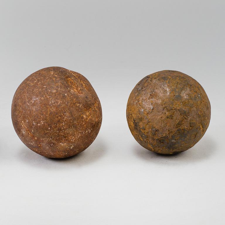 FOUR CAST IRON CANON BALLS, possibly 18th century.