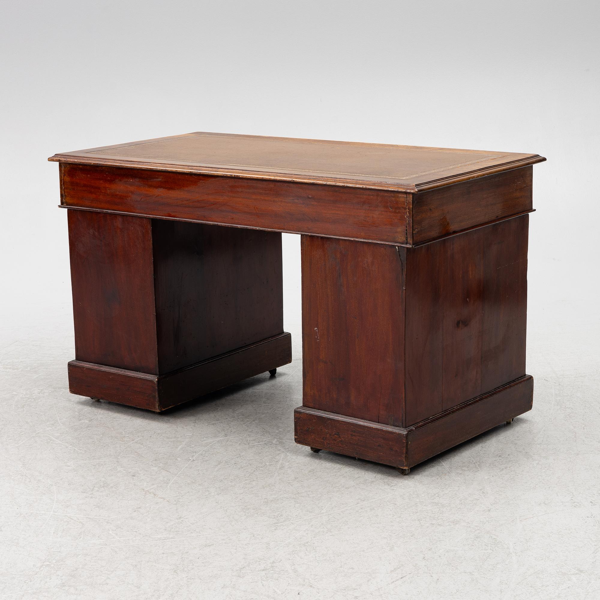 An English style desk, circa 1900.