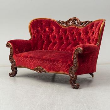 A later part of the 19th century Rococo style sofa.