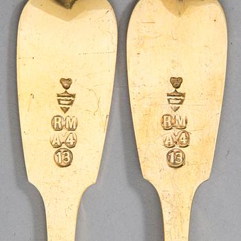 A 3-piece gilt silver cutlery set, maker's mark of Otto Roland Mellin, Helsinki 1882.