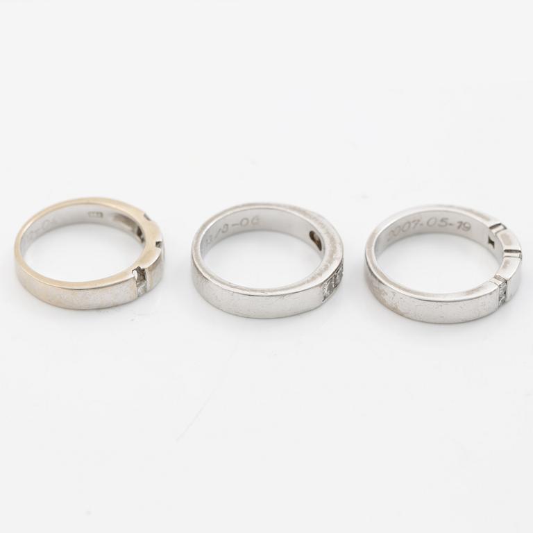 Three rings, 18K white gold with brilliant-cut and princess-cut diamonds.