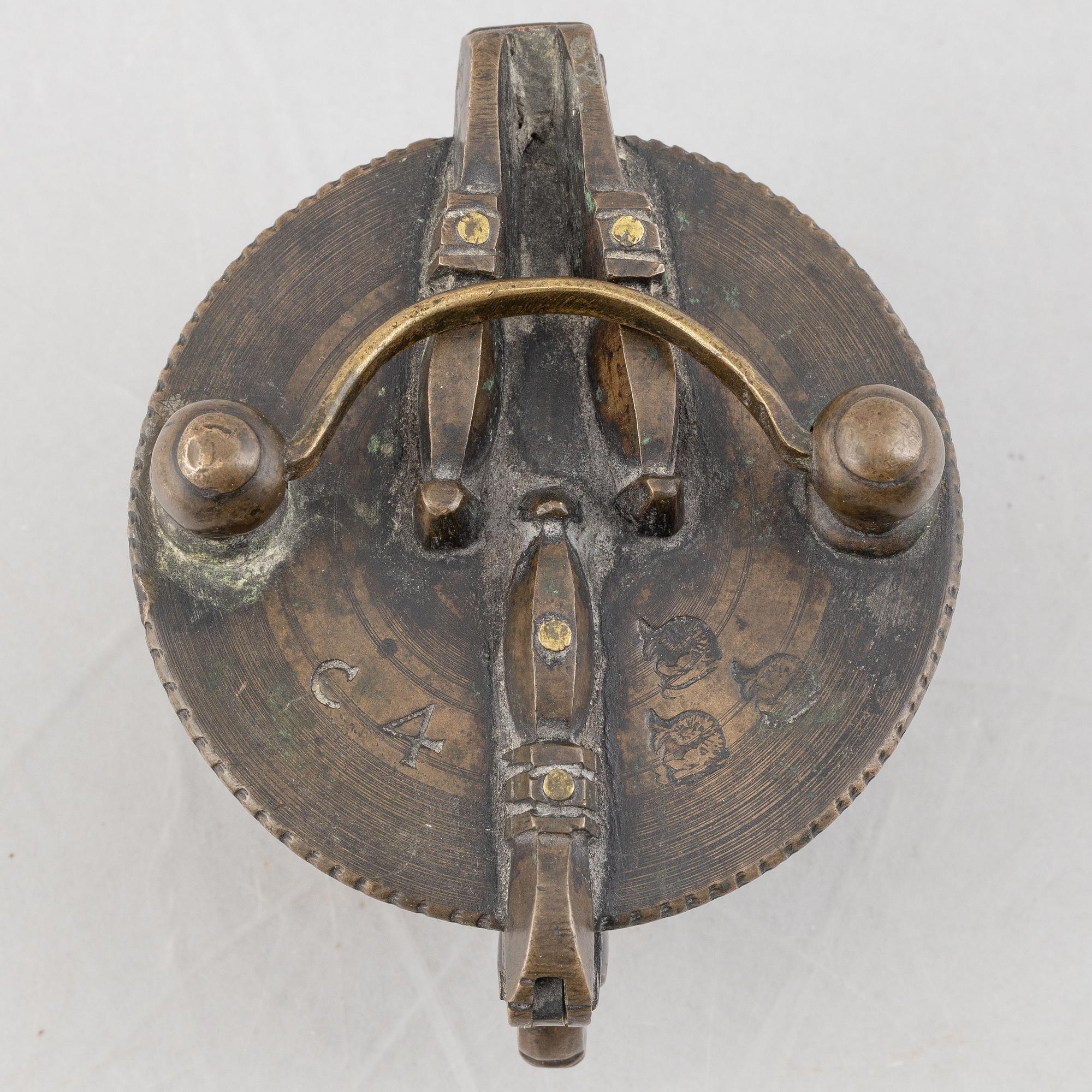 A set of three Nuremberg brass nested cup weights, one by Christoph or Johan Conrad Schön (masters 1746(1750).
