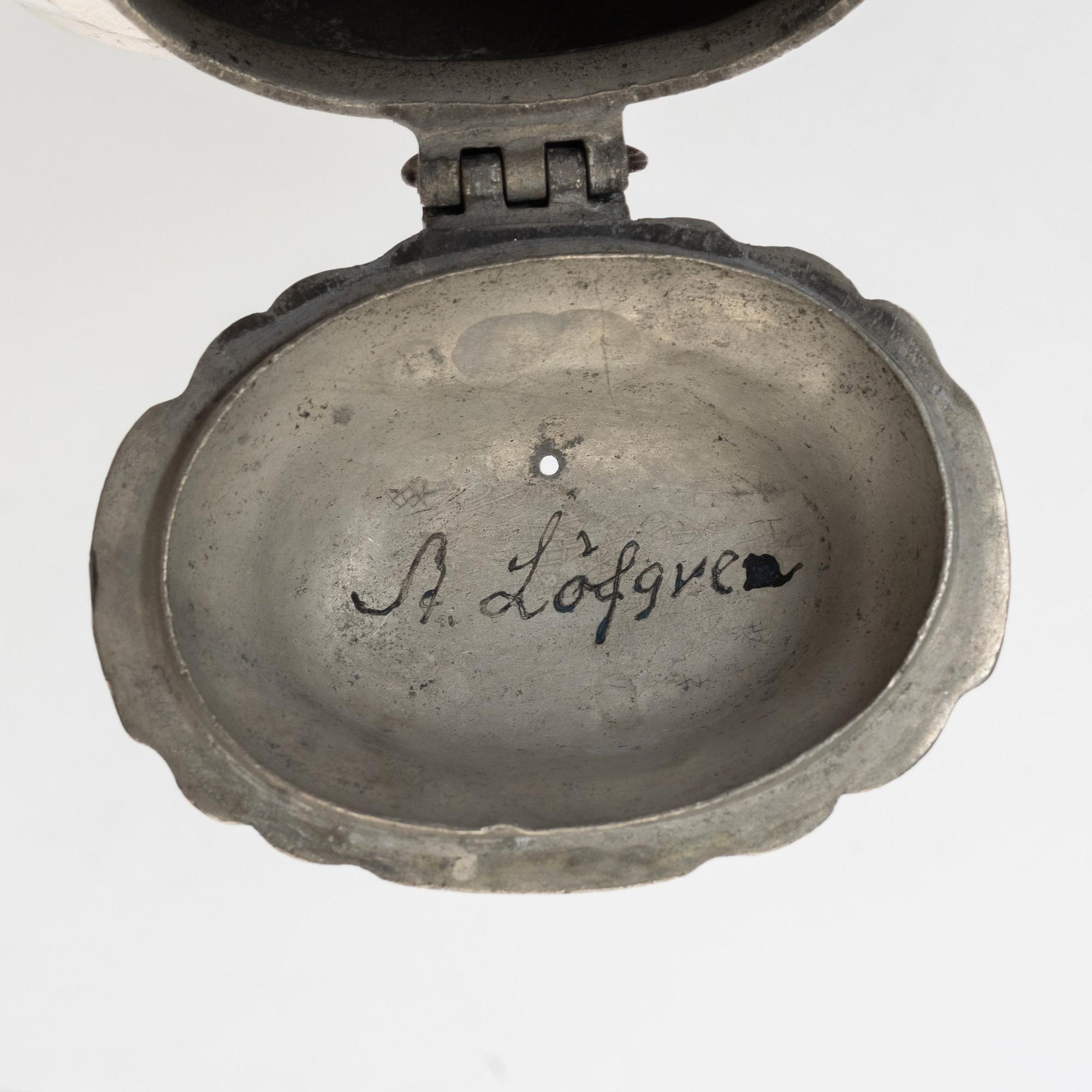 A Rococo pewter teapotby P J Mattsson 1808.