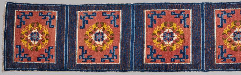 MATTO, a meditation carpet, ten squares, a semi-antique Ningxia, China, ca 598,5 x 62 cm.