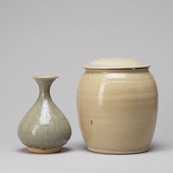 A celadon glazed jar with cover and a vase, South East Asia, 16/17th Century.