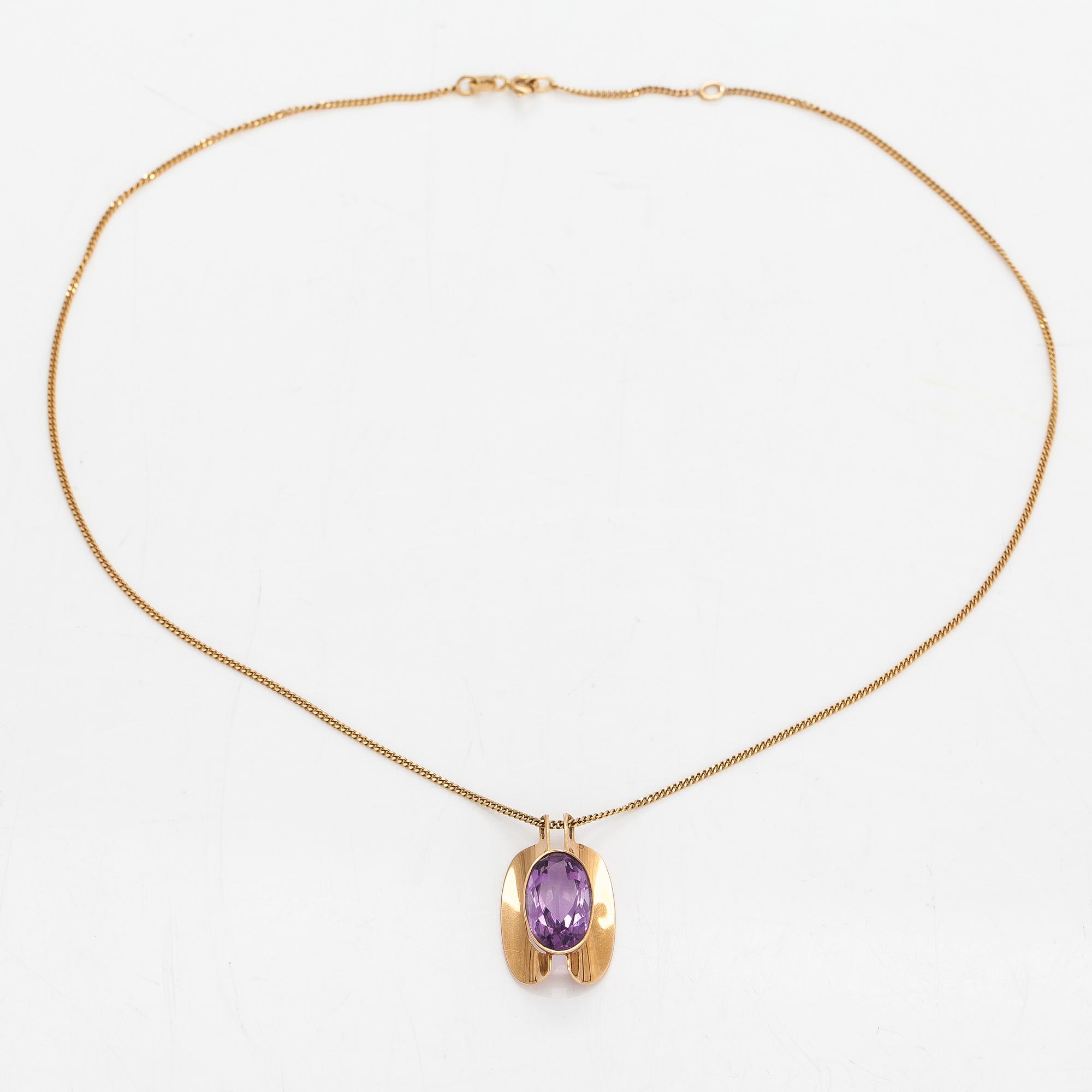 Eero Rislakki, A 14K gold necklace with an amethyst. Westerback, Helsinki 1960.