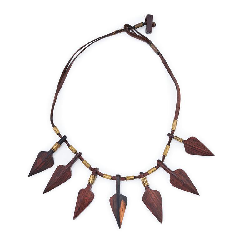 Vivianna Torun Bülow-Hübe, a leather, wood and brass necklace, executed in her own studio, Stockholm ca 1950.