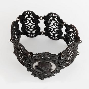 A Berlin iron and steel bracelet with a cameo.