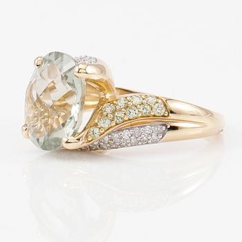 RING, 10K guld, kvarts, peridoter och diamanter tot ca 0.25 ct.