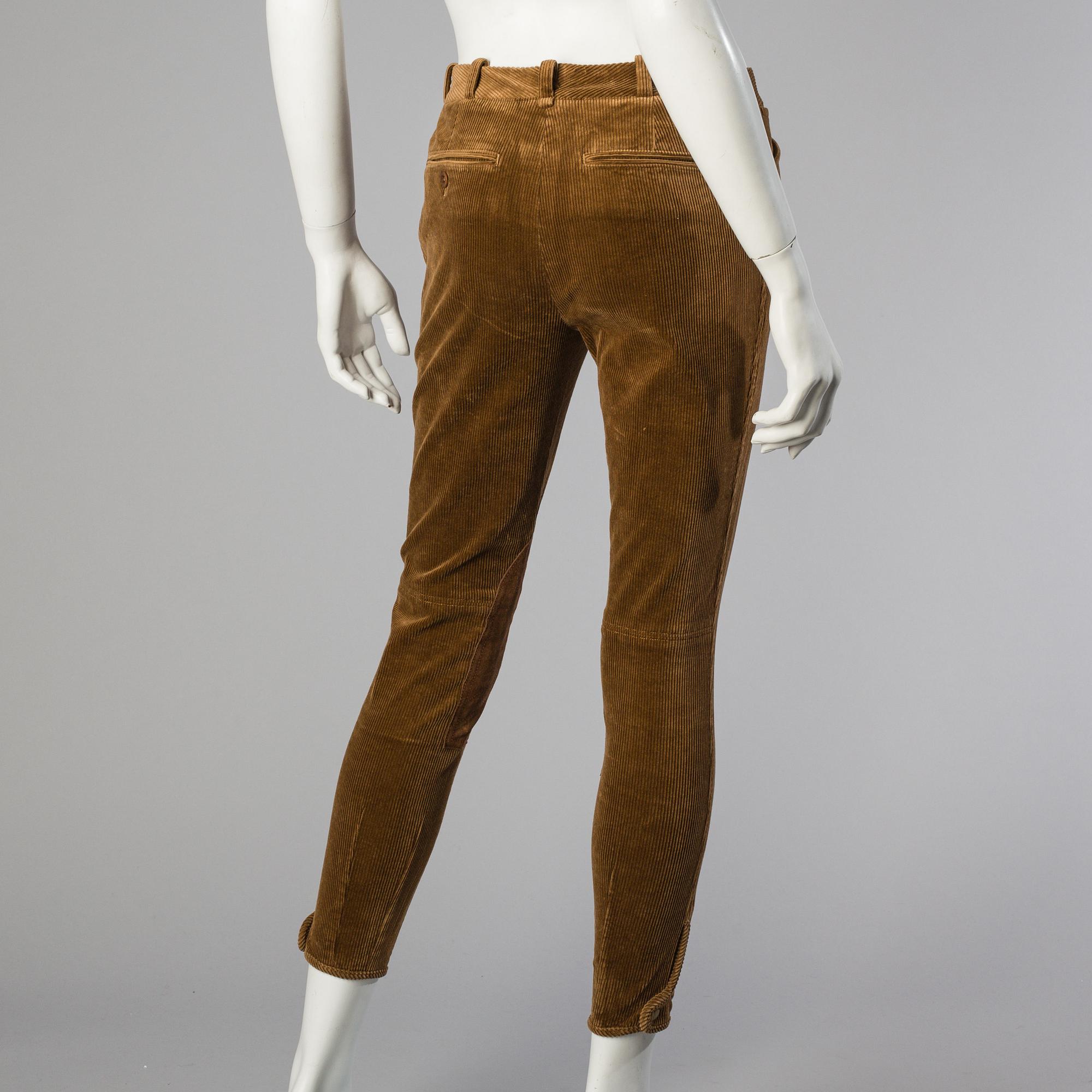 Three pair of trosers by Ralph Lauren.