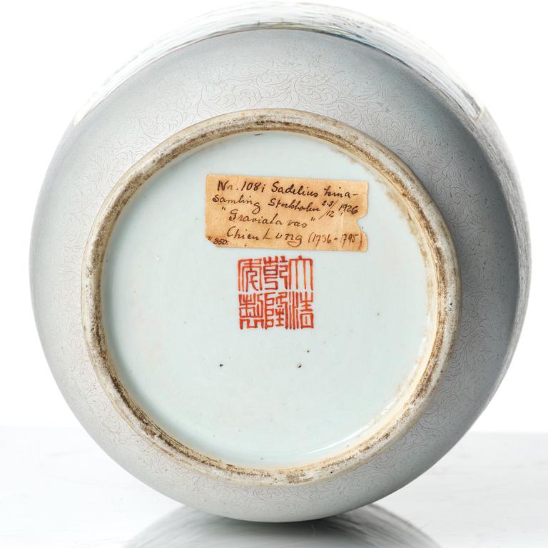 A large famille rose and scrafitto landscape vase, Qing dynasty, with Qianlong seal mark in red.