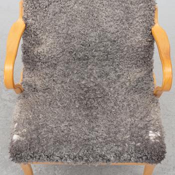 Bruno Mathsson, Armchair with footstool, "Miranda", Bruno Mathsson International, Värnamo, 2001.