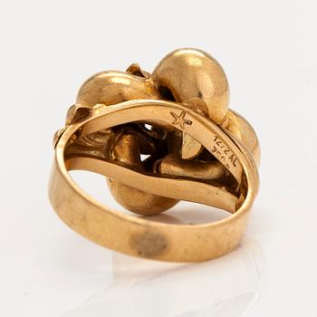 An 18K gold ring. Foreign hallmarks.