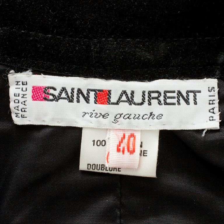 YVES SAINT LAURENT, a black suede skirt.