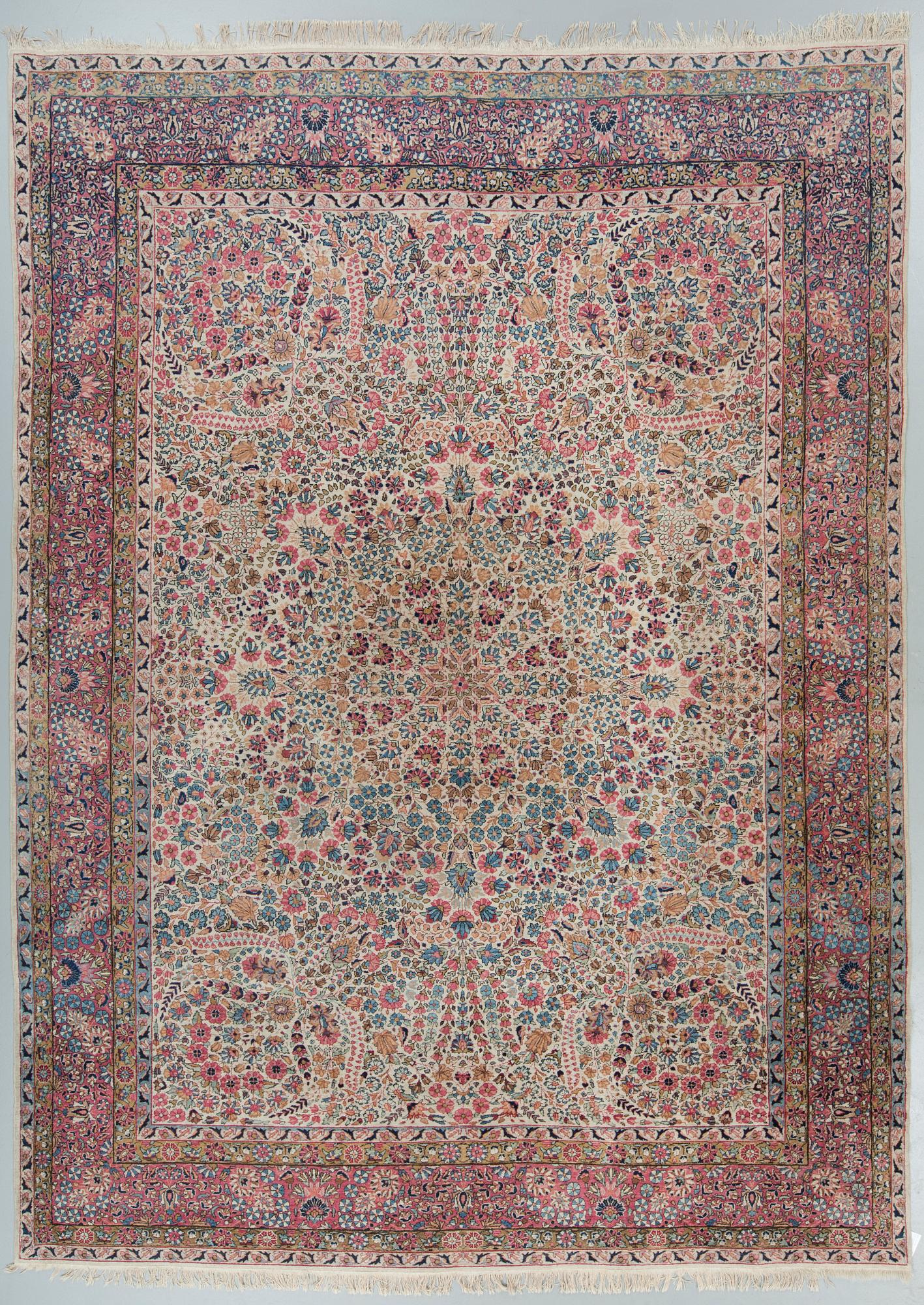A semi-antique/old Kerman carpet, around 361 x 264 cm.