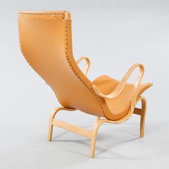 An armchair designed by Bruno Mathson, made by Firma Karl Mathsson 1965.