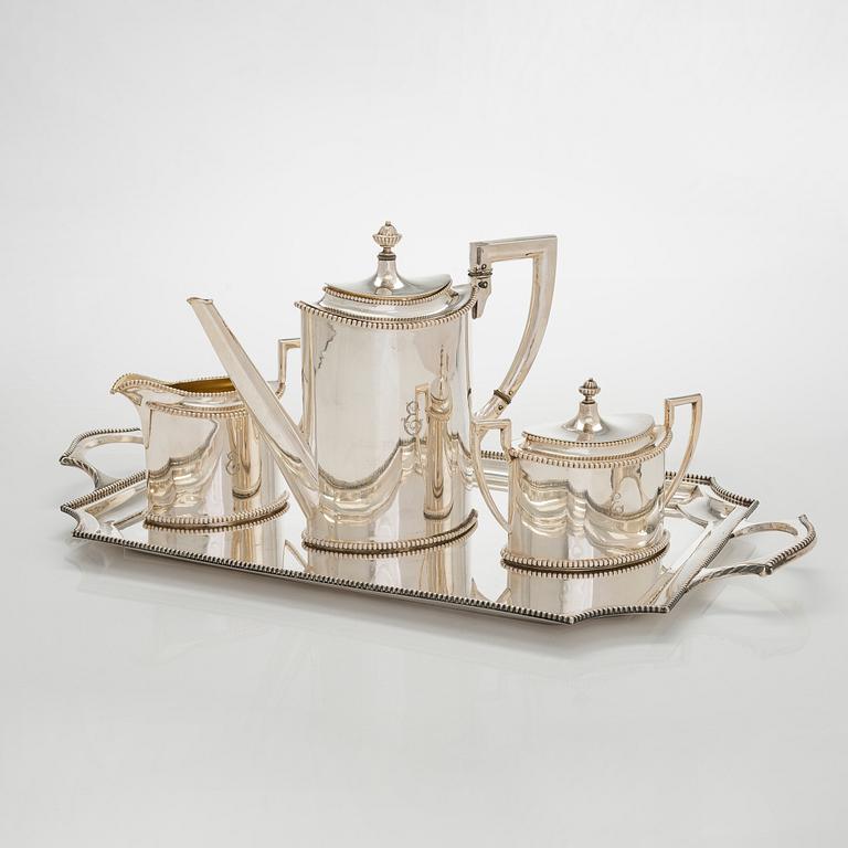 An early 20th century 4- piece sterling silver empire coffee set, C.G. Hallbergs Guldsmeds AB, Stockholm.