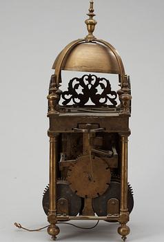 An English middle 17th century brass lantern clock signed Thomas Loomes At The Mermayd In Lothbury.