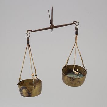 A 19th/20th century brass scale.