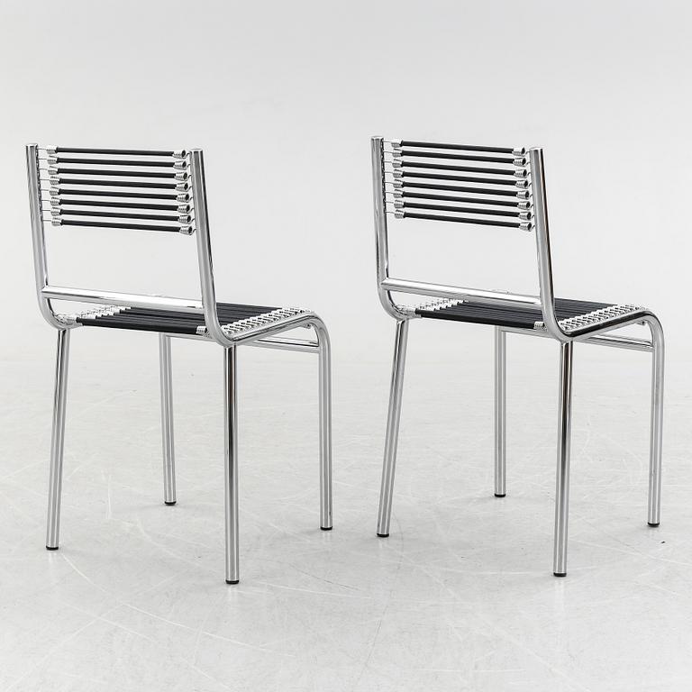 A pair of Rene Herbst chromium-plated, "Sandows" chairs, late 20th century.