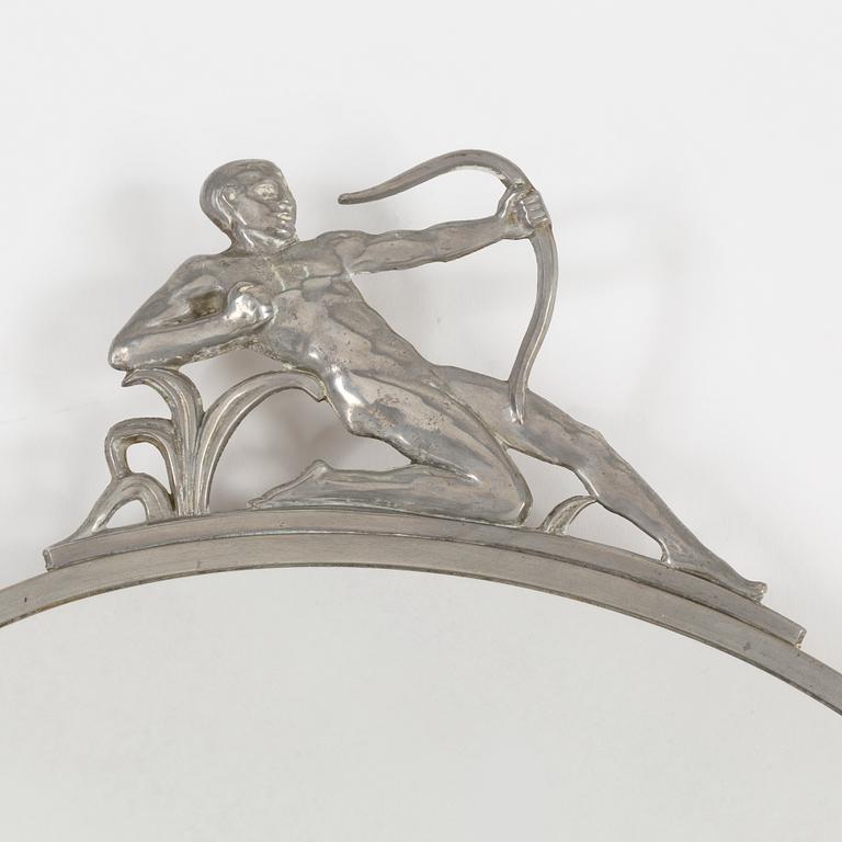 A Art Deco pewter mirror, 1930 / 40s.