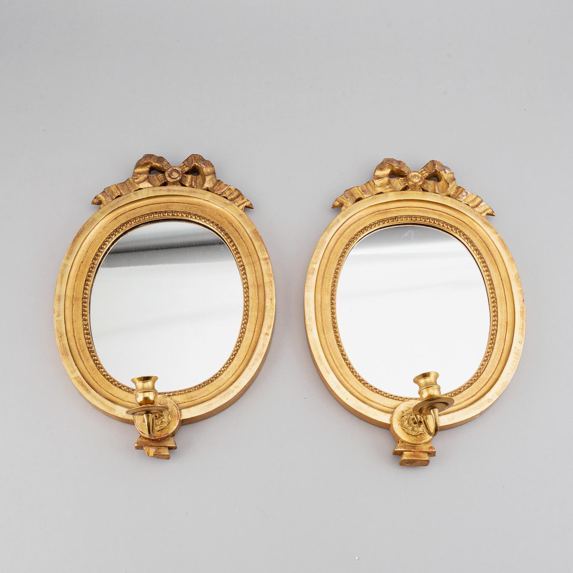 A mirror and a pair of mirror scones, gustavian style, 20th century.