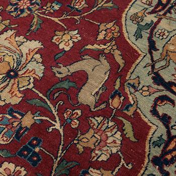 A CARPET, A semi-antique Esfahan part silk, ca 350,5 x 233,5 cm.