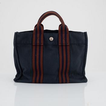 Hermès, "Fourre tout PM" bag and toiletry bag.