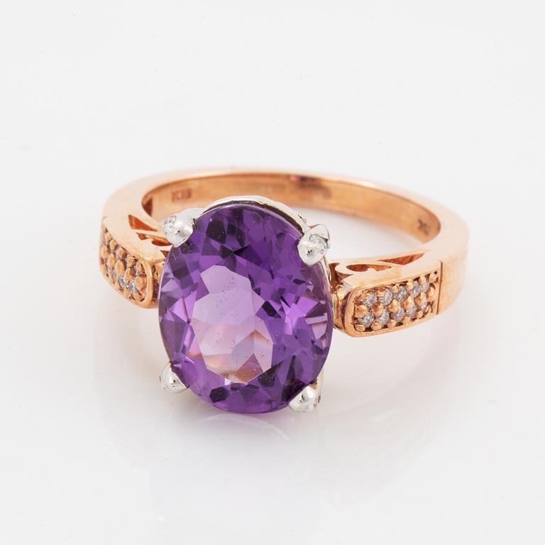 Oval faceted amethyst and brilliant-cut diamond ring.