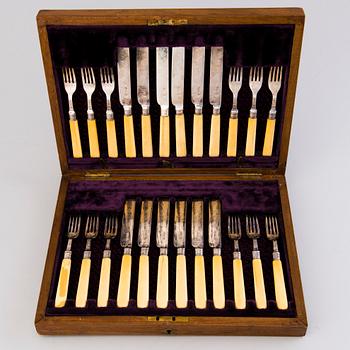 CUTLERY, 12+12, silver with bone handles, Sheffield 1894.