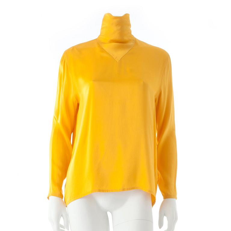 GUY LAROCHE, a yellow silk blouse.