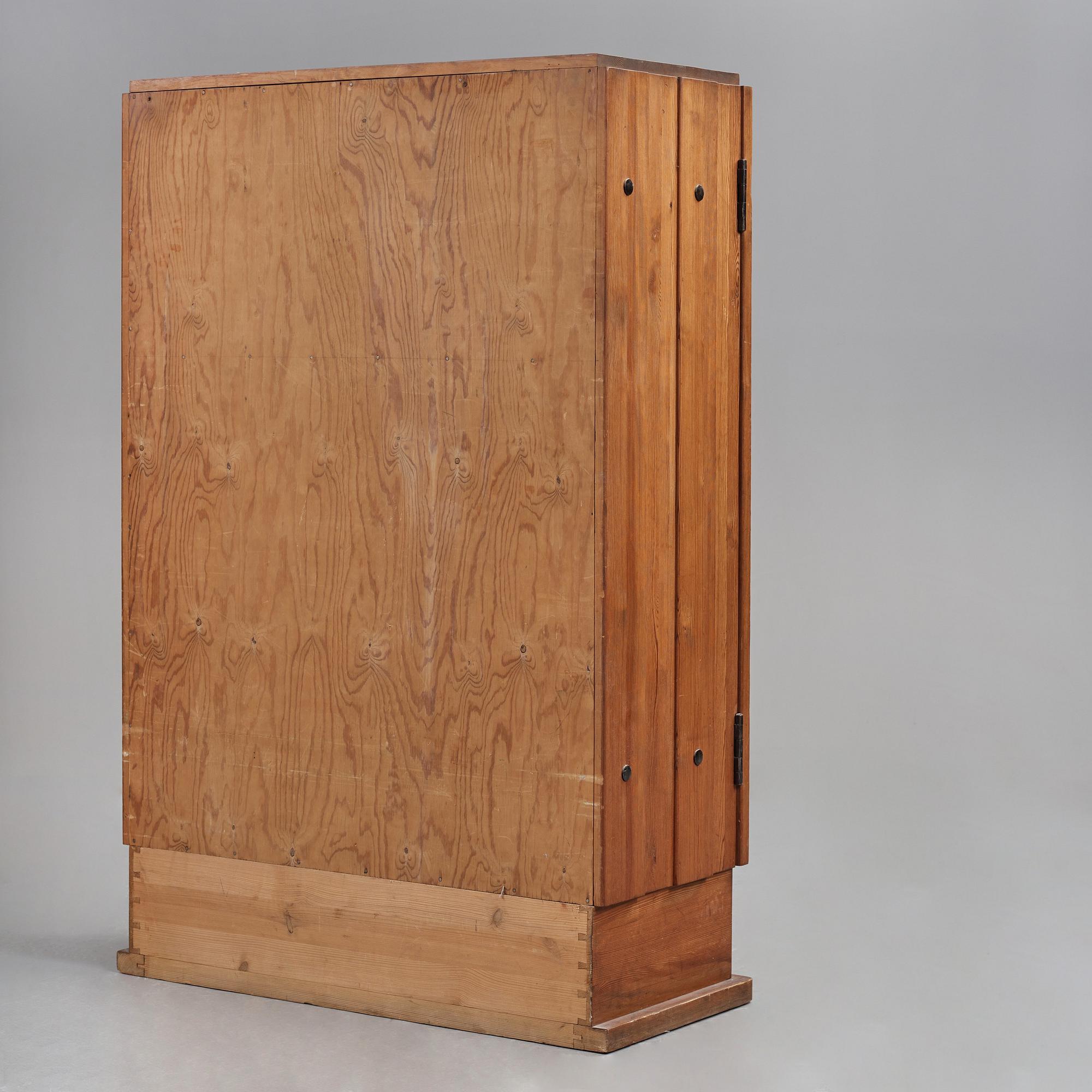 Axel Einar Hjorth, a stained pine "Lovö" cabinet, Nordiska Kompaniet, Sweden 1930's.