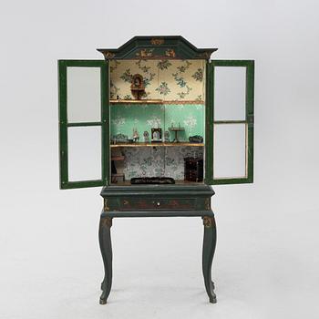 An 18th century cabinet / doll's house.