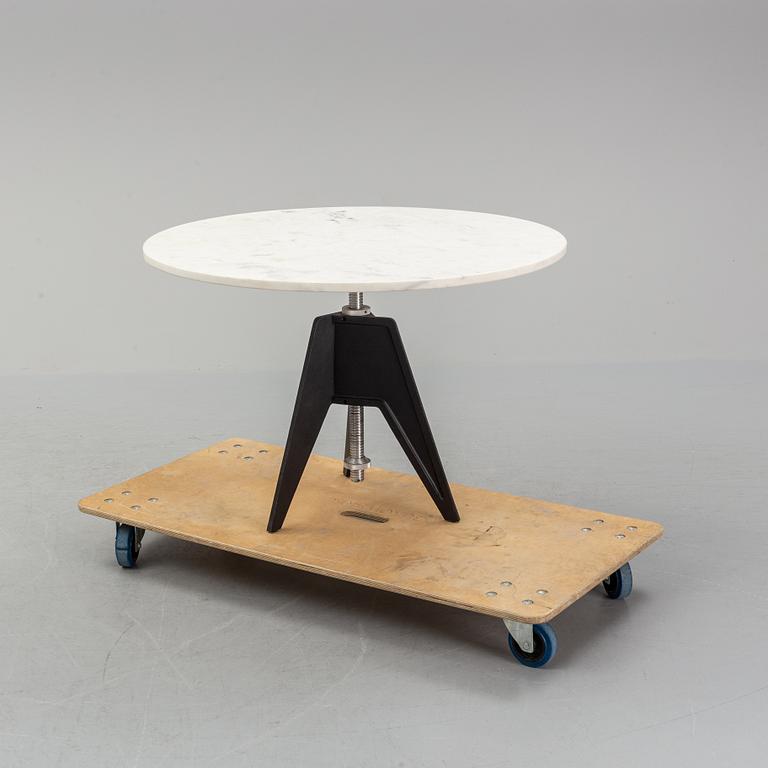 A Tom Dixon Screw Café Table.