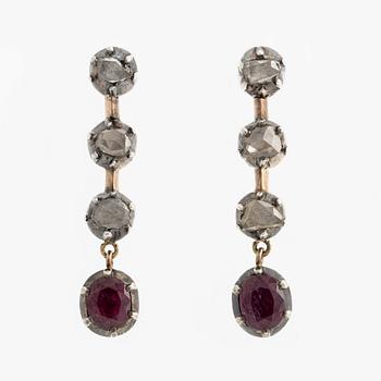 Earrings with rubies and rose-cut diamonds.