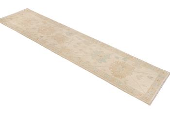An Ushak runner carpet, c. 360 x 80 cm.
