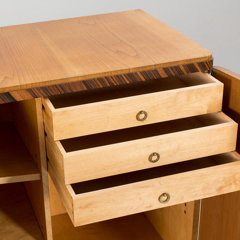 A "MODEL OK" SIDEBOARD DESIGNED BY AXEL EINAR HJORTH FOR NORDISKA KOMPANIET.